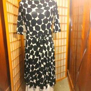 Elegant Black and White Patterned Dress94 Percent Rayon 6 Percent Spandex
